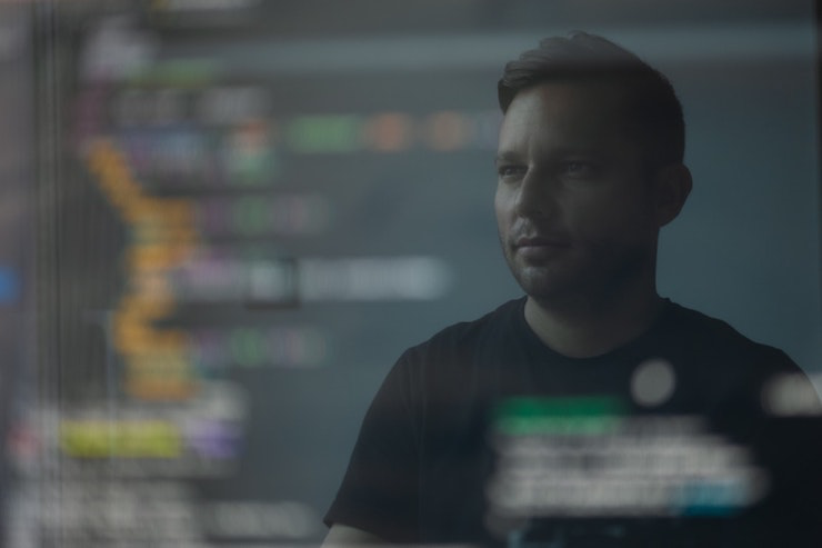 A man sitting in front of a computer